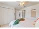 Bright bedroom with double bed and built-in closet at 5504 Hamlin Close Rd, Davenport, FL 33896