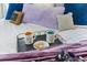 Close-up of cozy bedspread with pillows and mugs on a tray at 5504 Hamlin Close Rd, Davenport, FL 33896