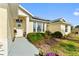 Landscaped front yard with walkway leading to house entrance at 5504 Hamlin Close Rd, Davenport, FL 33896