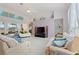 Spacious living room with vaulted ceilings, white marble floors and comfortable seating at 5504 Hamlin Close Rd, Davenport, FL 33896