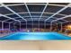 Inviting, screened pool with blue water, perfect for nighttime swims at 5504 Hamlin Close Rd, Davenport, FL 33896