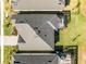 Aerial view of house, backyard, and screened patio at 636 Mosaic Blvd, Daytona Beach, FL 32124