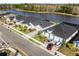 Community view showing houses near a lake at 636 Mosaic Blvd, Daytona Beach, FL 32124