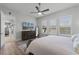 Bedroom with a queen-size bed and large window at 636 Mosaic Blvd, Daytona Beach, FL 32124