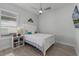 Guest bedroom with a full-size bed and wood floors at 636 Mosaic Blvd, Daytona Beach, FL 32124