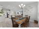 Dining room features a rustic table and chairs and an open floor plan at 636 Mosaic Blvd, Daytona Beach, FL 32124