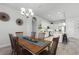 Bright dining room features a wooden table with seating for six at 636 Mosaic Blvd, Daytona Beach, FL 32124