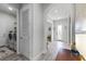Home entryway with tile floors, laundry room and glass door at 636 Mosaic Blvd, Daytona Beach, FL 32124