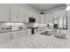 Granite countertop kitchen with stainless steel appliances at 636 Mosaic Blvd, Daytona Beach, FL 32124