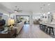 Open concept living room and kitchen with modern finishes at 636 Mosaic Blvd, Daytona Beach, FL 32124