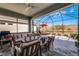 Relaxing screened patio with seating area and water view at 636 Mosaic Blvd, Daytona Beach, FL 32124