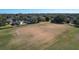 Aerial view of a sports field, complete with soccer goals in a well-maintained grassy area at 661 Cricklewood Ter, Lake Mary, FL 32746