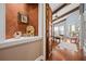 Bedroom view featuring beamed ceilings, a four-poster bed, and an open doorway at 661 Cricklewood Ter, Lake Mary, FL 32746
