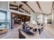 Beautiful indoor/outdoor living with beamed vaulted ceilings and lots of natural light at 661 Cricklewood Ter, Lake Mary, FL 32746
