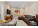 Comfortable living room with a sofa, wood floors, and a decorative rug at 661 Cricklewood Ter, Lake Mary, FL 32746