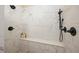 This walk-in shower is accented with marble tile and features two shower heads and a corner bench at 661 Cricklewood Ter, Lake Mary, FL 32746