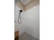Walk in shower with white subway tile, gray floor and matte black shower head at 661 Cricklewood Ter, Lake Mary, FL 32746