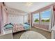 Bright bedroom with pink walls and a four-poster bed at 7387 Duxbury Ln, Winter Garden, FL 34787