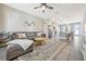 Spacious living room with comfortable seating and open floor plan at 7387 Duxbury Ln, Winter Garden, FL 34787