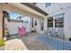 Covered patio with string lights and seating area at 7387 Duxbury Ln, Winter Garden, FL 34787