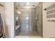 Large walk-in shower with glass enclosure and gray tile at 7387 Duxbury Ln, Winter Garden, FL 34787