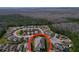 Aerial view of a single-Gathering home in a residential neighborhood at 754 San Joaquin Rd, Kissimmee, FL 34759