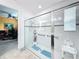 Walk-in shower with grab bars and bench, great for accessibility at 754 San Joaquin Rd, Kissimmee, FL 34759