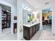 Elegant bathroom with double vanity, walk-in shower, and large closet at 754 San Joaquin Rd, Kissimmee, FL 34759