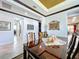 Bright dining room features a large table, decorative accents, and access to the kitchen at 754 San Joaquin Rd, Kissimmee, FL 34759