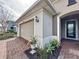 Inviting exterior with a two-car garage and landscaping at 754 San Joaquin Rd, Kissimmee, FL 34759