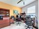 Home office with desk, chair, and built-in shelving at 754 San Joaquin Rd, Kissimmee, FL 34759