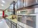 Kitchen with stainless steel appliances and granite countertops at 754 San Joaquin Rd, Kissimmee, FL 34759