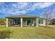 Screened porch overlooks backyard and provides relaxing space at 754 San Joaquin Rd, Kissimmee, FL 34759