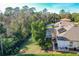 Aerial view showcasing home's backyard and pool at 842 Palm Oak Dr, Apopka, FL 32712