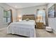 Spacious bedroom with king-size bed and stylish nightstands at 8719 Crescendo Ave, Windermere, FL 34786