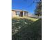 Large backyard with screened patio and grassy area at 984 Maypole Dr, Apopka, FL 32703