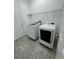 Bright laundry room with washer and dryer at 984 Maypole Dr, Apopka, FL 32703