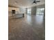 Open concept living area with tile flooring and kitchen view at 984 Maypole Dr, Apopka, FL 32703