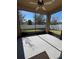 Cozy screened porch overlooking backyard at 984 Maypole Dr, Apopka, FL 32703