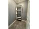 Storage room with shelving for extra storage at 984 Maypole Dr, Apopka, FL 32703