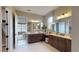 Spacious bathroom featuring double vanities, ample counter space, and a bright, open design at 987 Ladyfish Trl, St Cloud, FL 34771