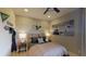 Stylish bedroom decorated with sports-themed decor and featuring a modern, comfortable bed at 987 Ladyfish Trl, St Cloud, FL 34771