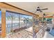 Lakefront balcony with ample seating at 10018 Lone Tree Ln, Orlando, FL 32836