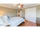 Bright bedroom with double doors and hardwood floors at 10018 Lone Tree Ln, Orlando, FL 32836
