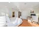 Bedroom with hardwood floors and built-in desk at 10018 Lone Tree Ln, Orlando, FL 32836