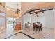 Elegant dining room with hardwood floors and a dramatic staircase at 10018 Lone Tree Ln, Orlando, FL 32836
