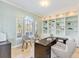 Bright home office features built-in shelving and a large window at 10018 Lone Tree Ln, Orlando, FL 32836
