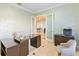 Spacious home office with built-in shelving and access to other rooms at 10018 Lone Tree Ln, Orlando, FL 32836