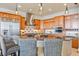 Modern kitchen with stainless steel appliances and wood cabinets at 10018 Lone Tree Ln, Orlando, FL 32836