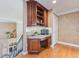 Convenient home office with built-in cabinetry and hardwood floors at 10018 Lone Tree Ln, Orlando, FL 32836